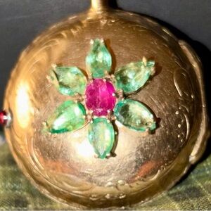 1740-60 18k/tested, runs well, original key, 6k emeralds, 2 rubies, diamonds.